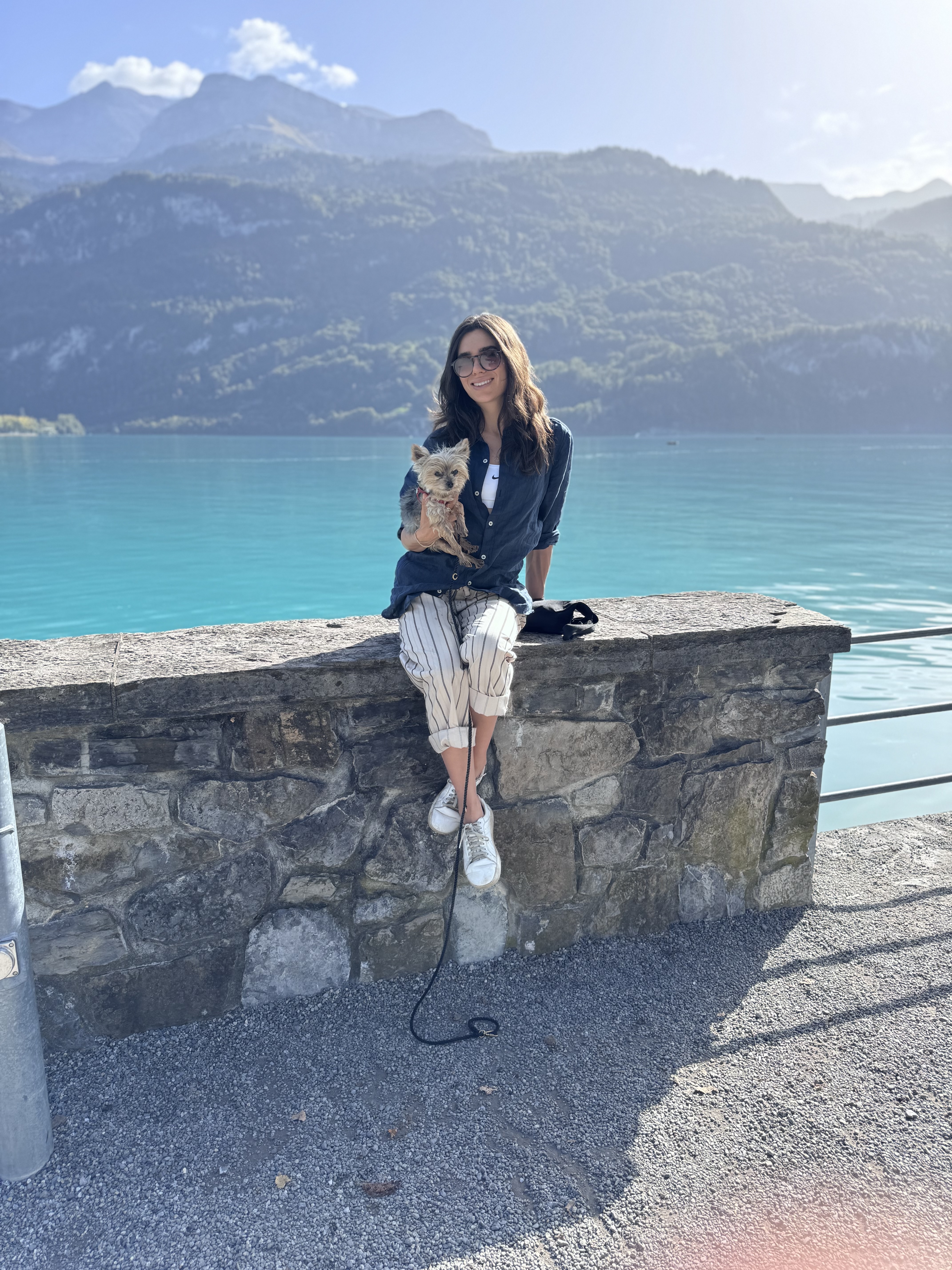 Jessica Koenig with one of her Yorkies by a lake